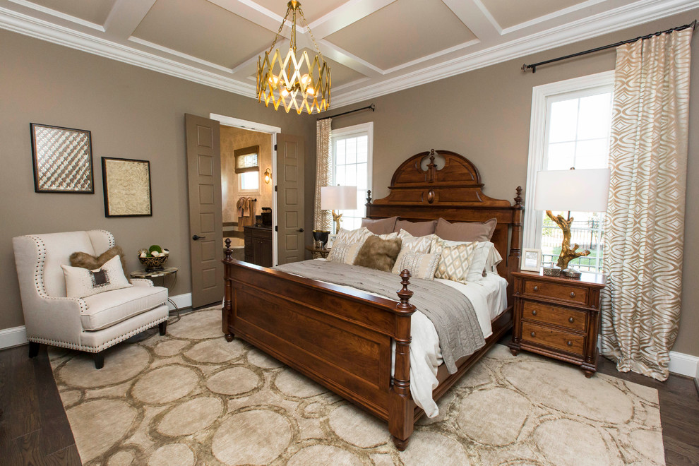 Inspiration for a large transitional master dark wood floor bedroom remodel in Louisville with beige walls