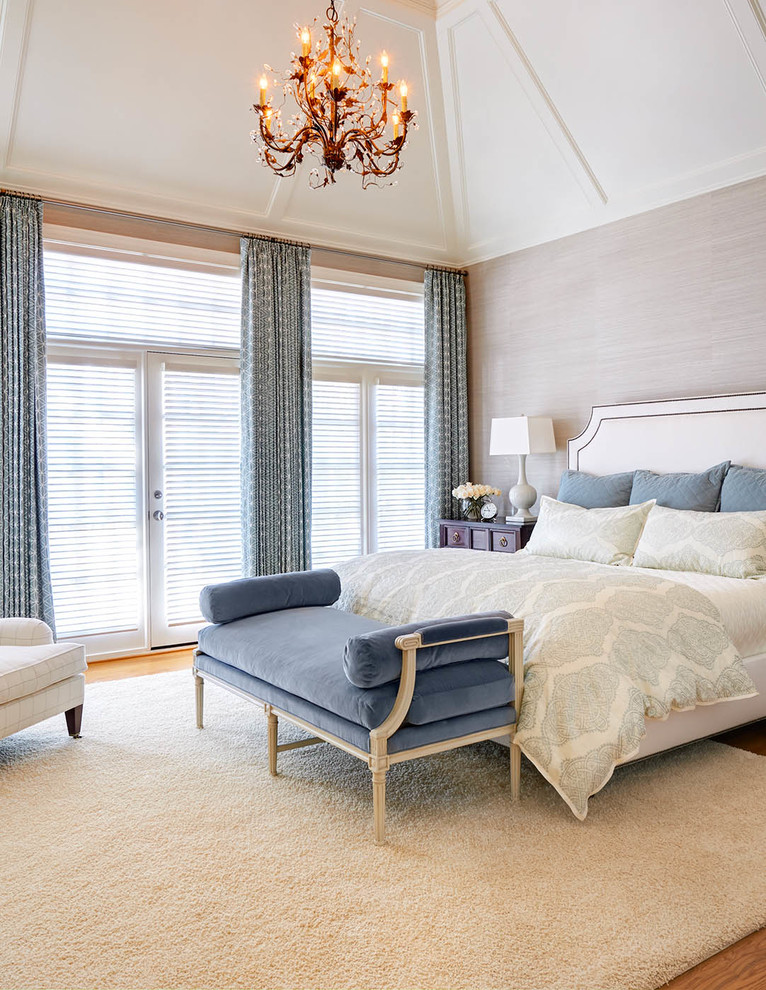 Example of a transitional bedroom design in Raleigh