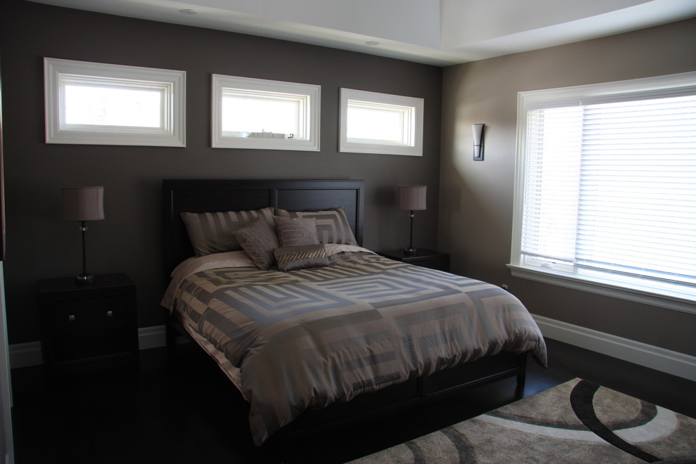 Example of a classic dark wood floor bedroom design in Toronto