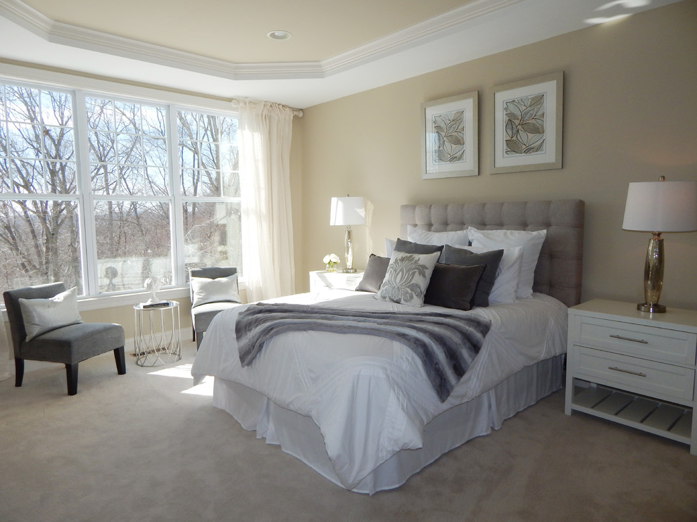 Mid-sized transitional master carpeted and beige floor bedroom photo in New York with beige walls and no fireplace