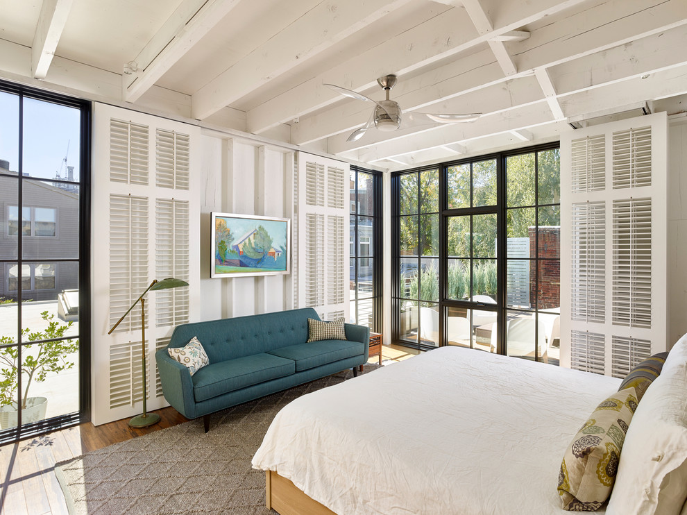 Photo of a large contemporary master bedroom in Philadelphia with white walls, bamboo flooring and no fireplace.