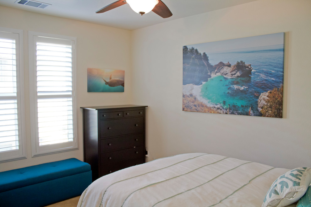 Design ideas for a medium sized coastal master bedroom in San Francisco with no fireplace, beige walls, carpet and brown floors.