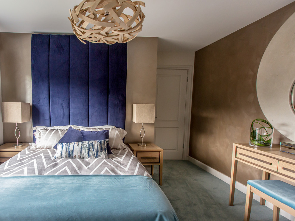 This is an example of a small contemporary bedroom in Dublin.