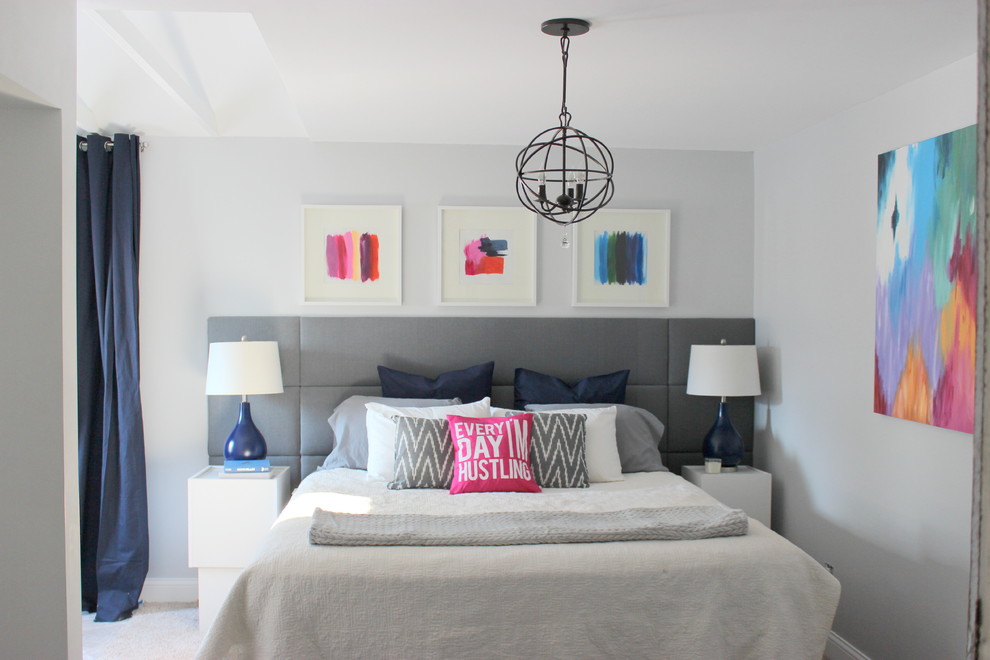 This is an example of a contemporary master and grey and pink bedroom in Minneapolis with grey walls and carpet.