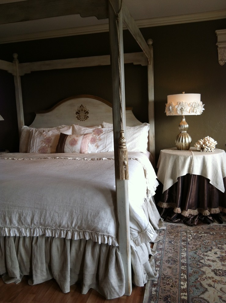 Photo of a shabby-chic style master and grey and pink bedroom in Oklahoma City with beige walls and beige floors.