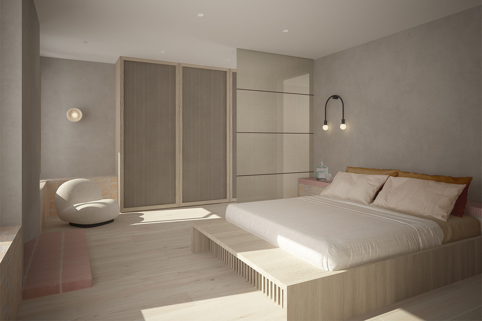 This is an example of a contemporary master bedroom in London.