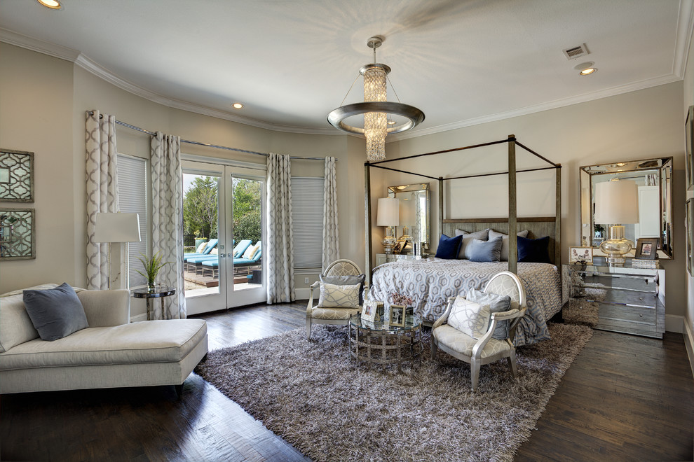 Large mediterranean master bedroom in Dallas with beige walls, dark hardwood flooring and no fireplace.