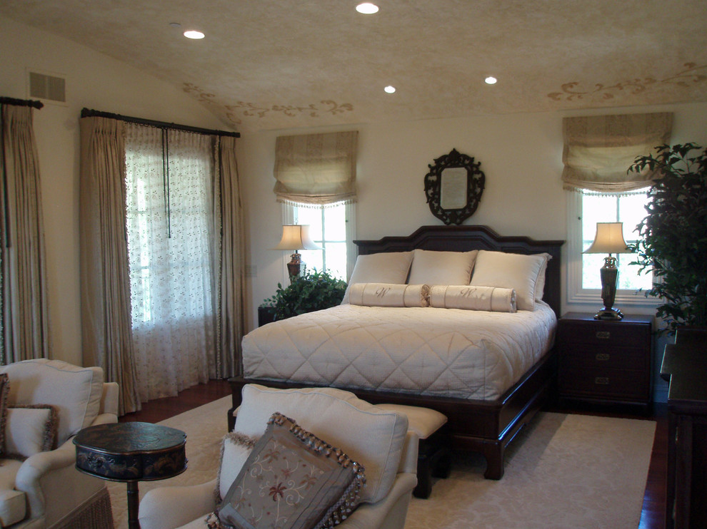 Elegant bedroom photo in Orange County