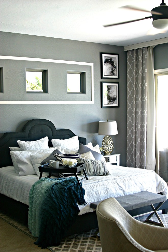 Inspiration for a large traditional master bedroom in Phoenix with grey walls, carpet, no fireplace and grey floors.