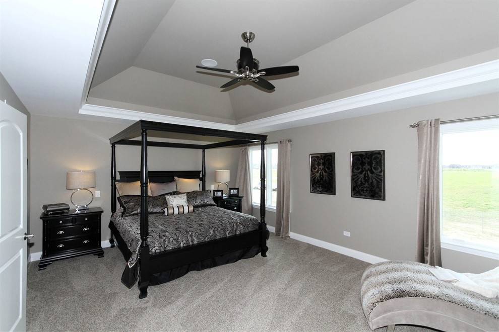 Large trendy master carpeted bedroom photo in Chicago with gray walls
