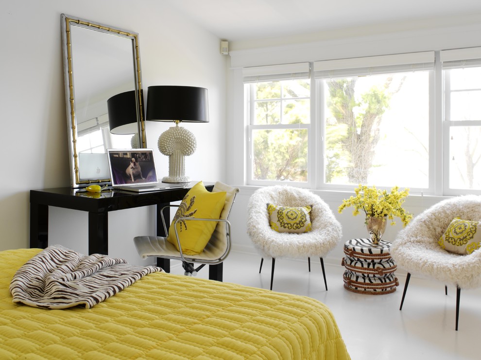 Design ideas for an eclectic master bedroom in New York with white walls and white floors.