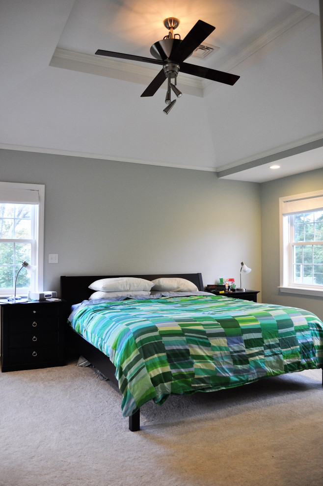 Design ideas for a classic master bedroom in Boston with a vaulted ceiling.