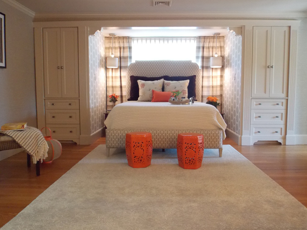Example of a mid-sized transitional master medium tone wood floor bedroom design in Boston with multicolored walls