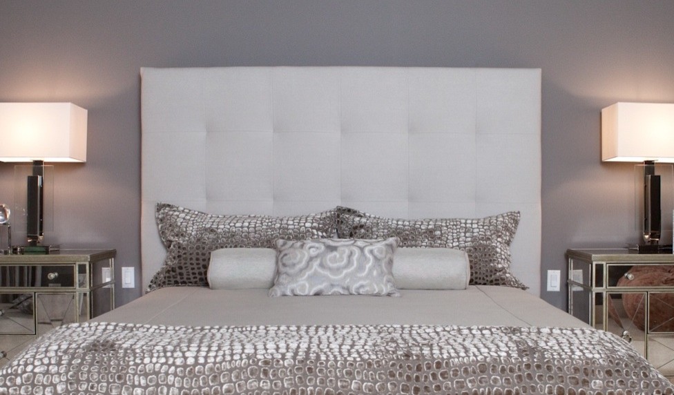 This is an example of an eclectic grey and silver bedroom in Chicago.