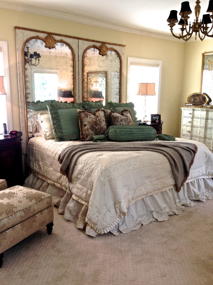 Design ideas for a medium sized traditional master bedroom in Other with beige walls and carpet.
