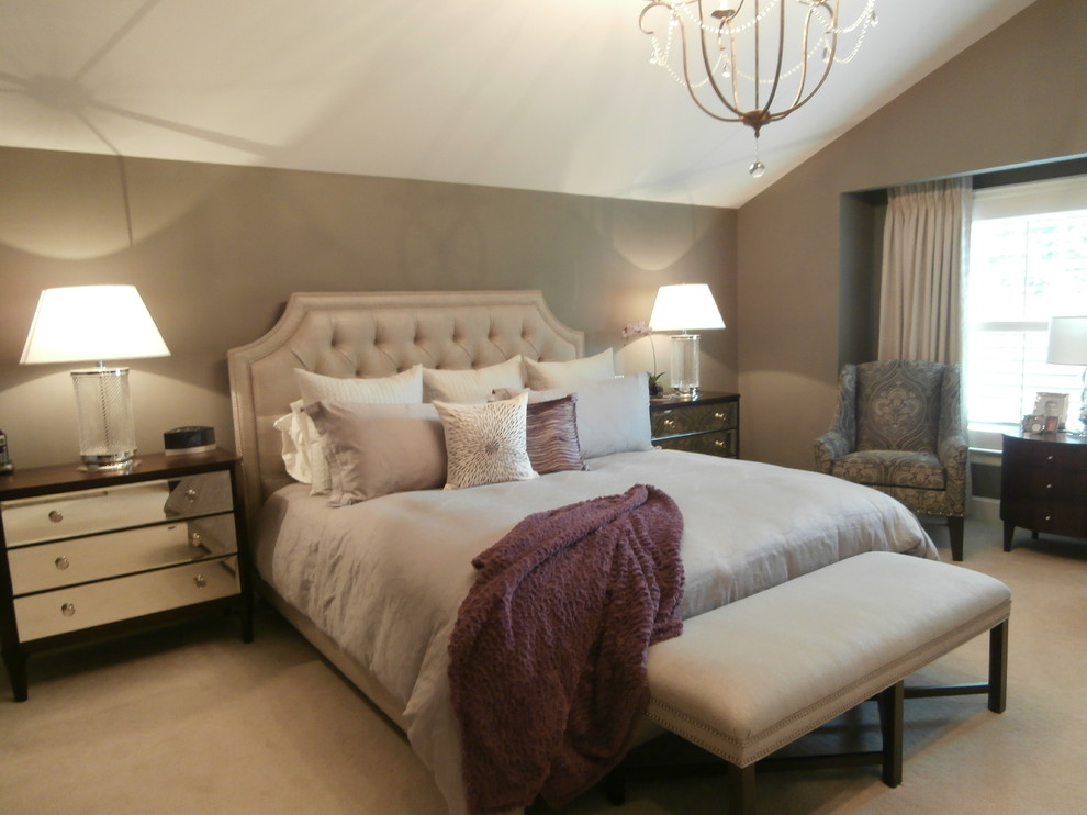 Example of a mid-sized trendy master carpeted and beige floor bedroom design in Detroit with gray walls