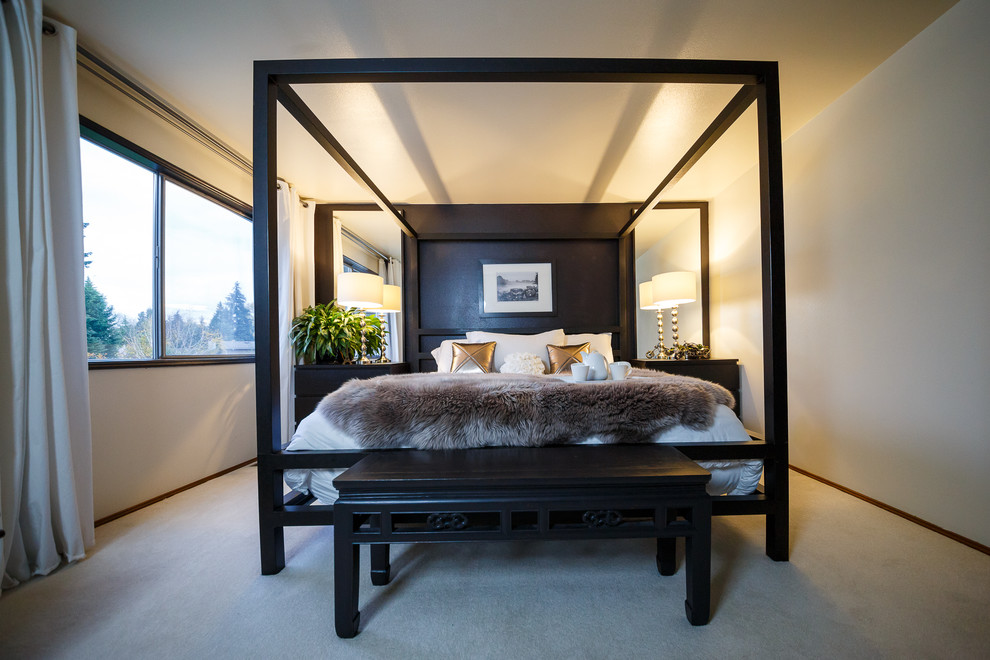 Inspiration for a transitional bedroom remodel in Seattle with black walls