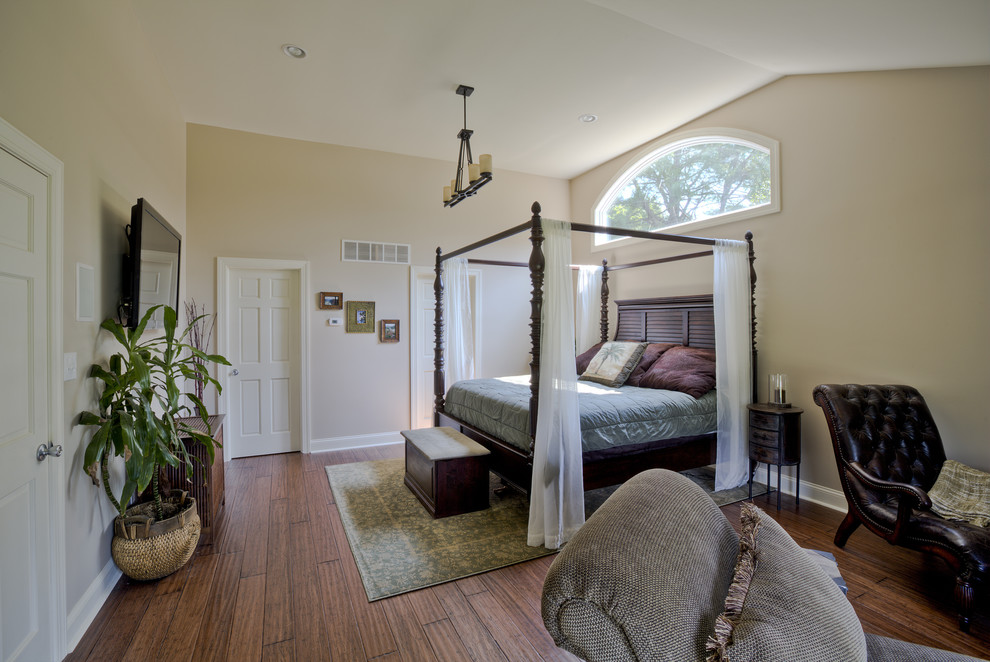 Large elegant master medium tone wood floor and brown floor bedroom photo in Philadelphia with beige walls and no fireplace