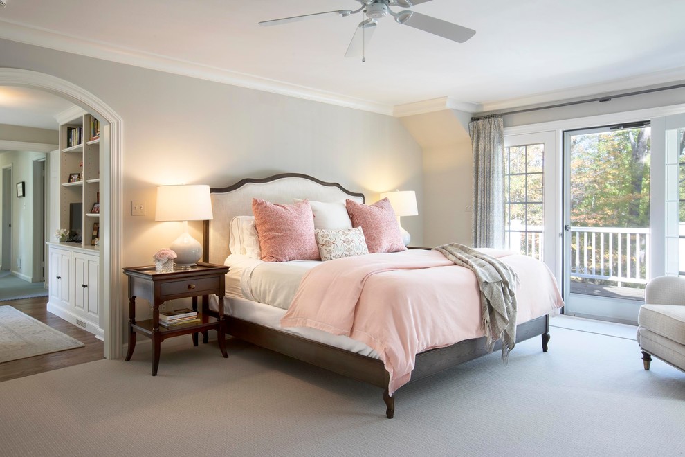This is an example of a large traditional guest bedroom in Cleveland with grey walls, carpet, no fireplace and grey floors.
