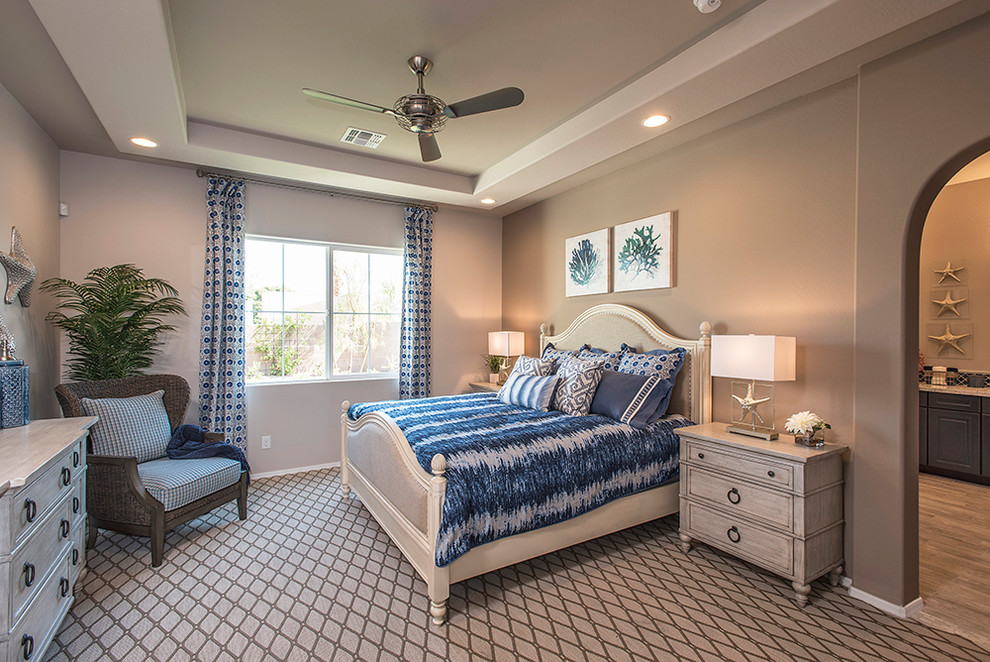 Design ideas for a coastal master bedroom in Phoenix with grey walls, carpet and grey floors.