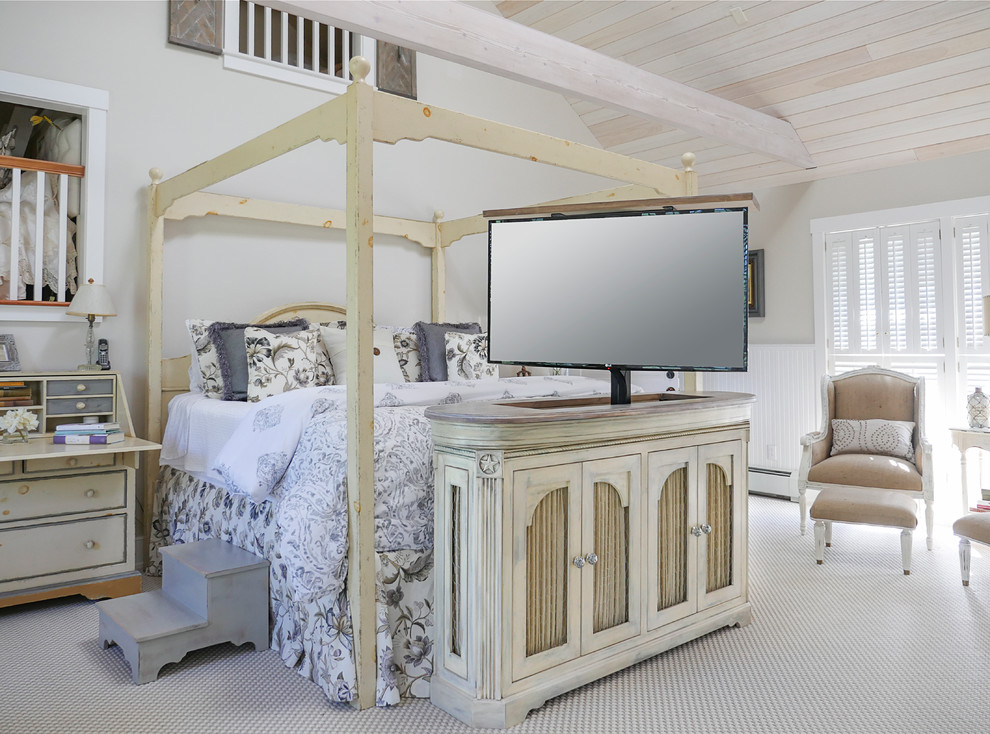 Inspiration for a large vintage master bedroom in Burlington with beige walls and carpet.