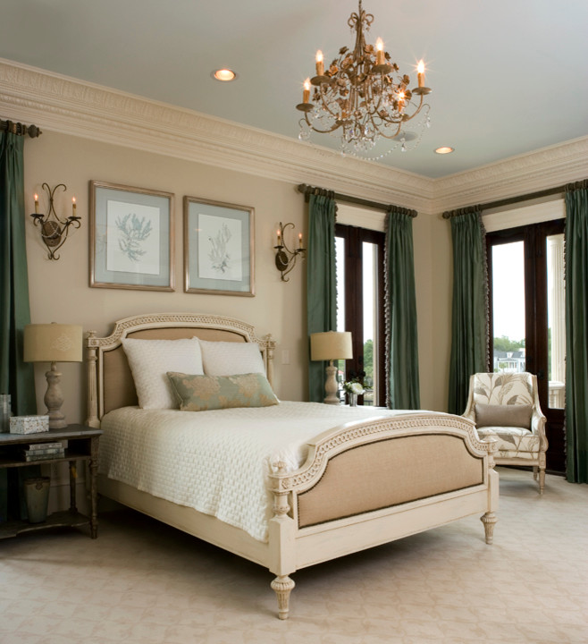 Inspiration for a large timeless master carpeted bedroom remodel in Charleston with beige walls and no fireplace