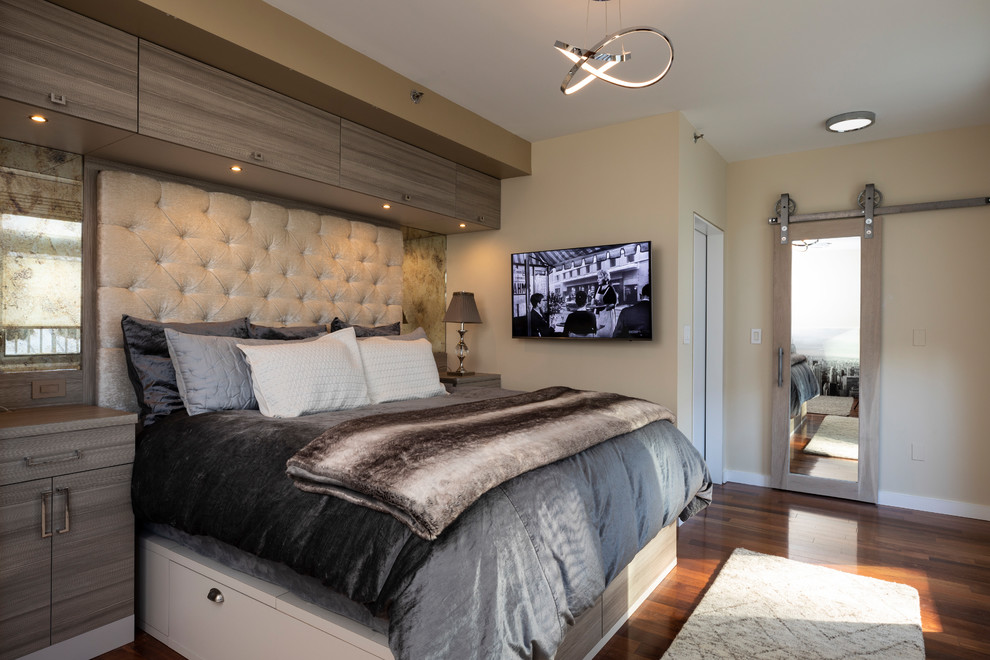 Bedroom - small contemporary master laminate floor and brown floor bedroom idea in New York with beige walls