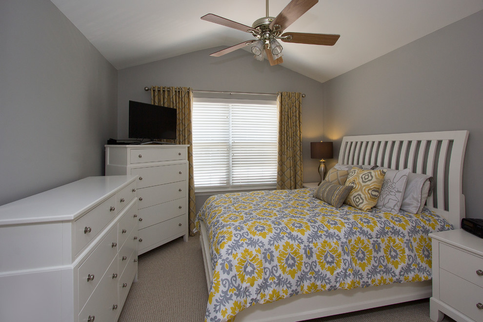 Inspiration for a mid-sized transitional master carpeted and beige floor bedroom remodel in Raleigh with gray walls