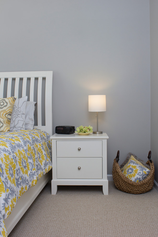 Example of a mid-sized transitional master carpeted and beige floor bedroom design in Raleigh with gray walls