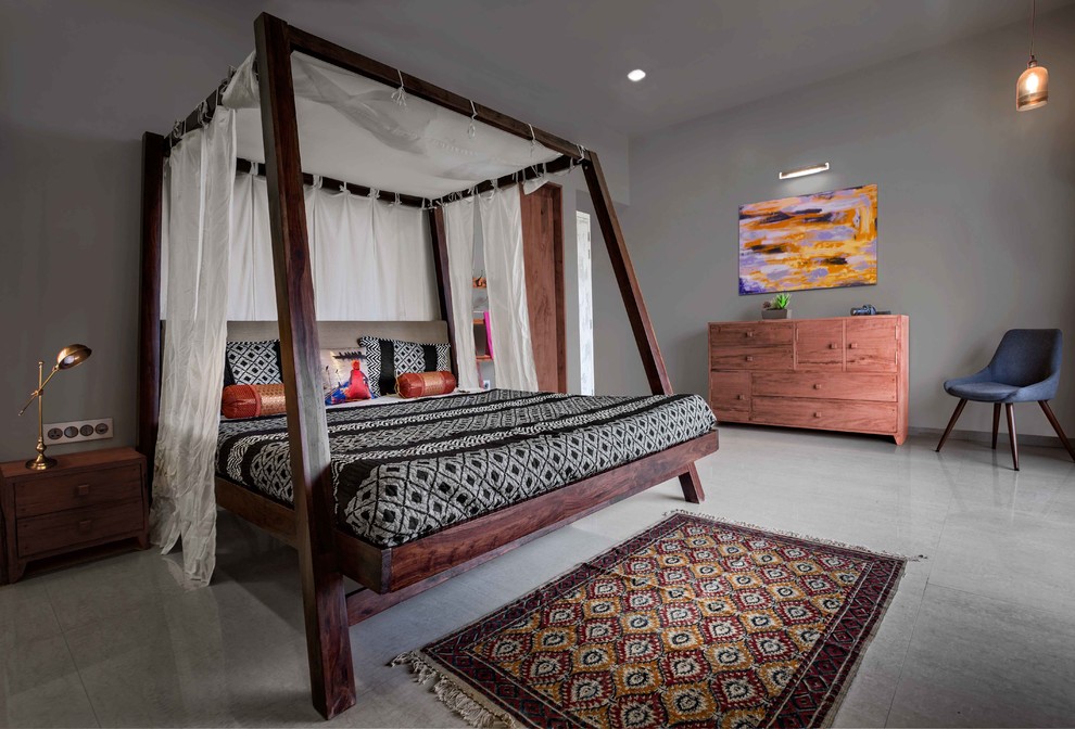 World-inspired grey and brown bedroom in Pune with grey walls.
