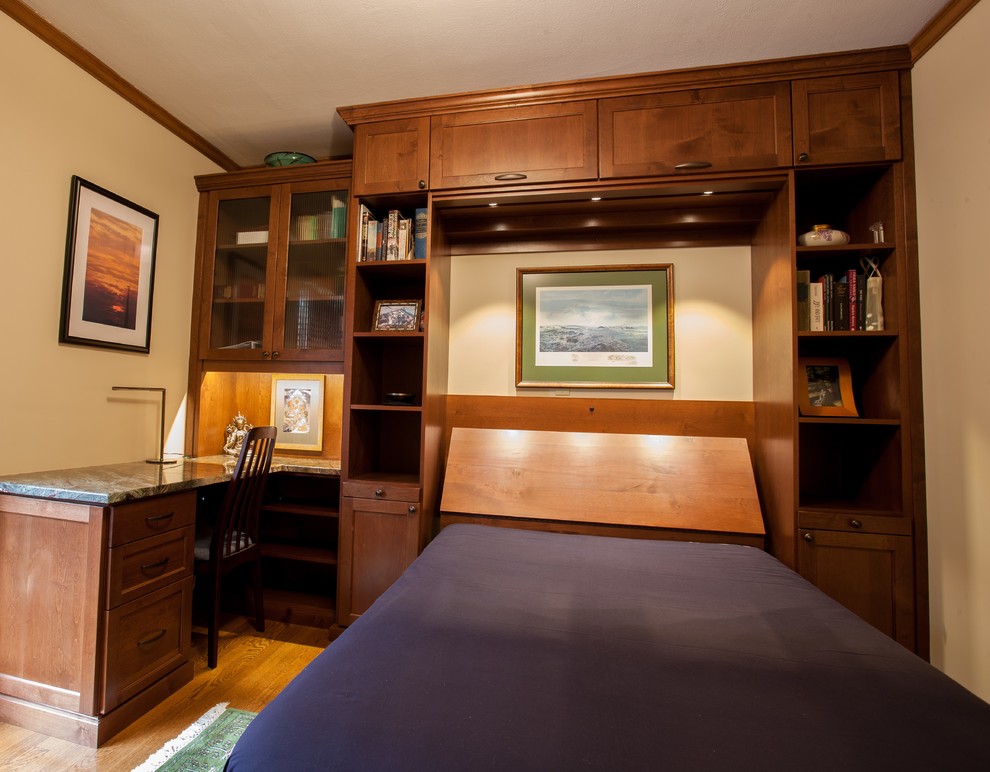 Photo of a small traditional guest bedroom in Portland with beige walls and dark hardwood flooring.