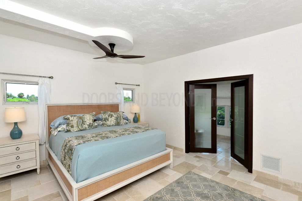 Design ideas for a medium sized contemporary master bedroom in Tampa with white walls.