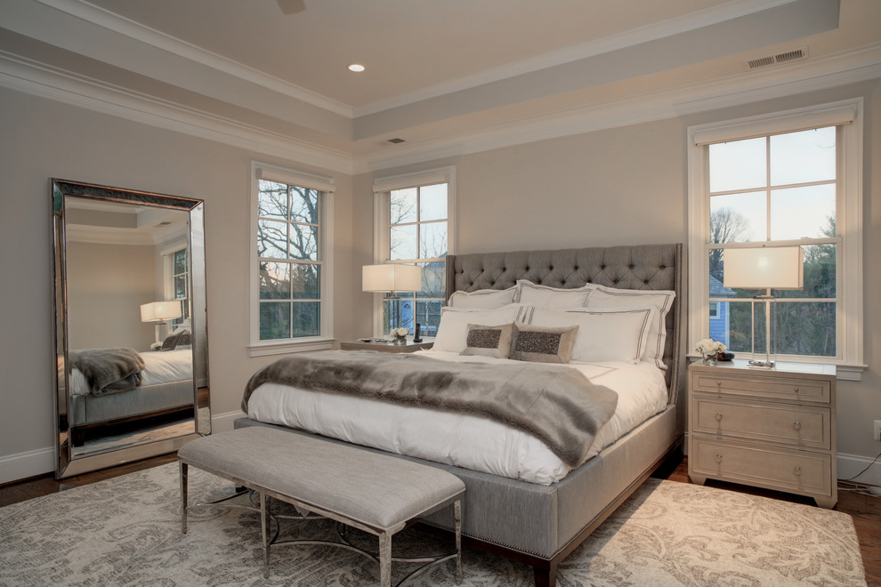 Photo of a large traditional master bedroom in DC Metro with grey walls, dark hardwood flooring and no fireplace.