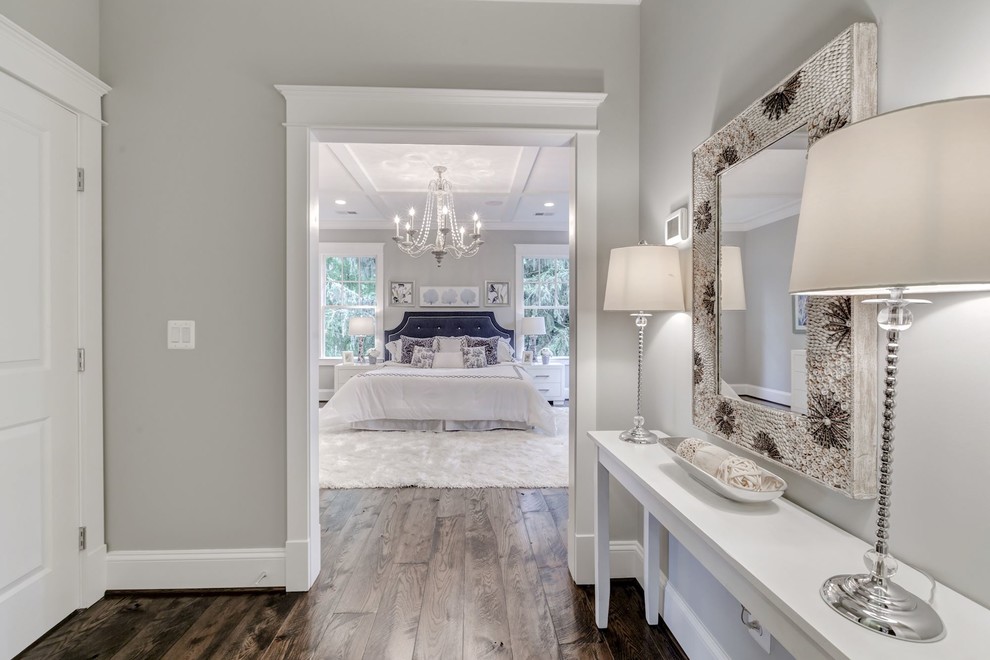 Large trendy master plywood floor bedroom photo in DC Metro with gray walls and no fireplace