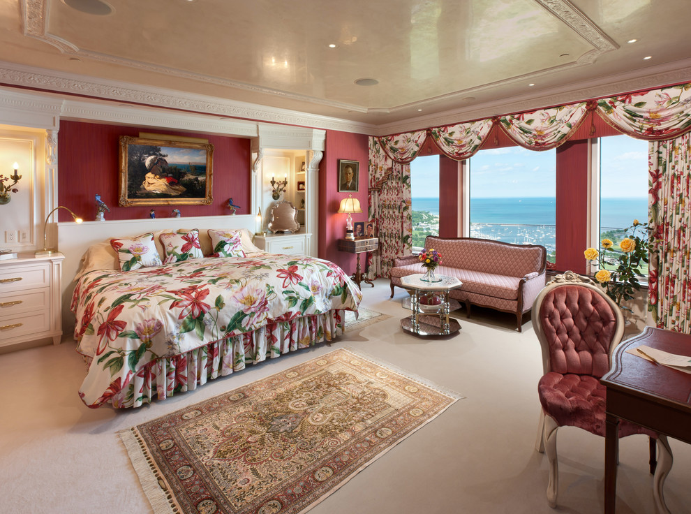 Imagen de dormitorio mediterráneo con paredes rojas y con escritorio