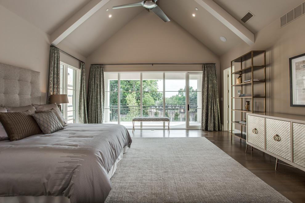 Example of a huge trendy master medium tone wood floor and brown floor bedroom design in Dallas with brown walls and no fireplace