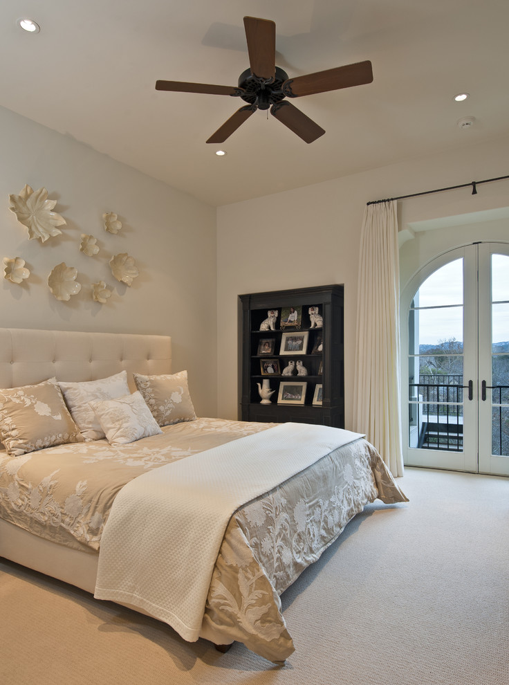 Bedroom - contemporary carpeted bedroom idea in Austin with beige walls