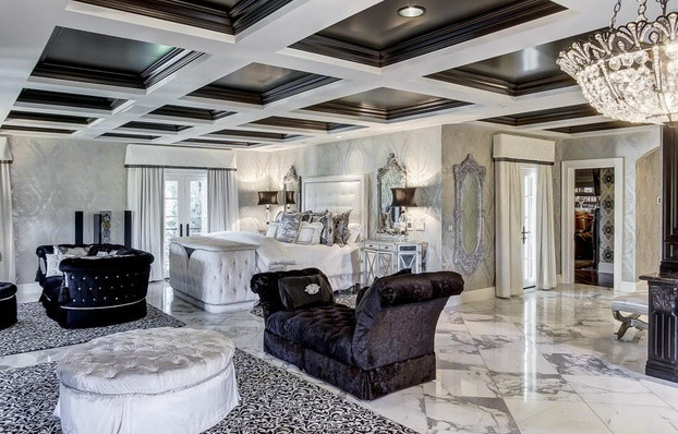 Bedroom - huge traditional master marble floor bedroom idea in Miami with white walls