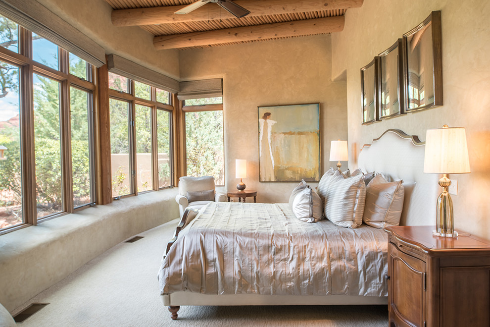 Medium sized guest bedroom in Phoenix with beige walls, carpet and no fireplace.