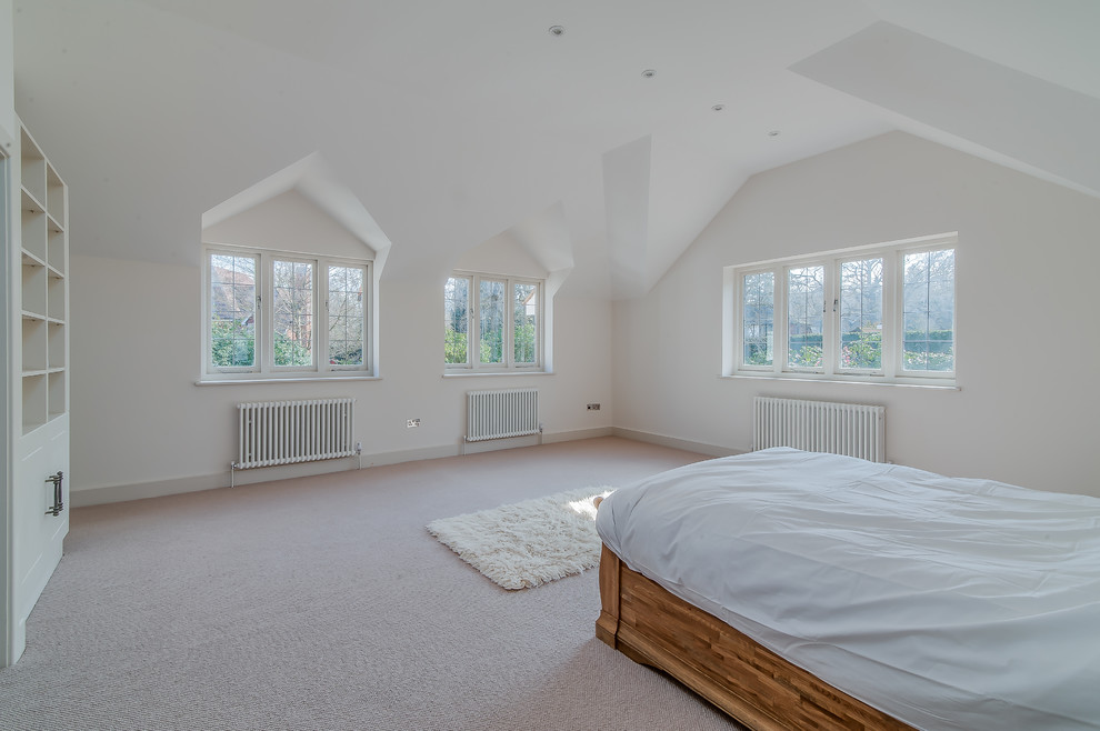 This is an example of a classic bedroom in Surrey.