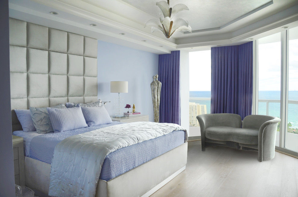 Inspiration for a large contemporary master and grey and silver bedroom in Miami.