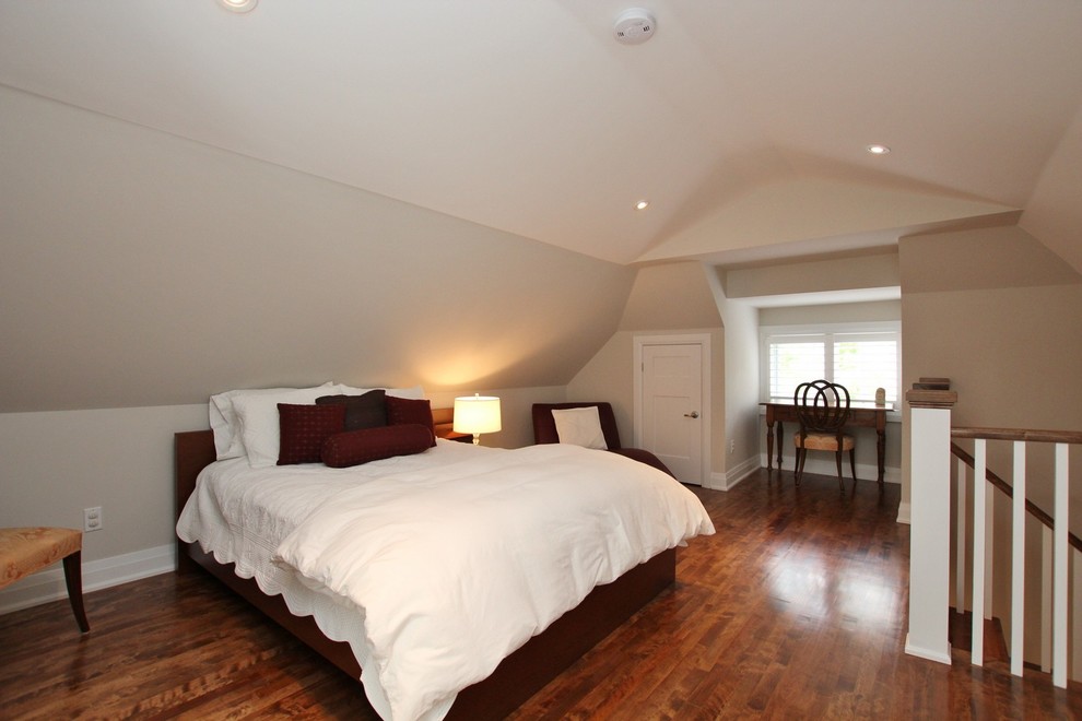 Bedroom - mid-sized transitional loft-style dark wood floor and brown floor bedroom idea in Other with beige walls