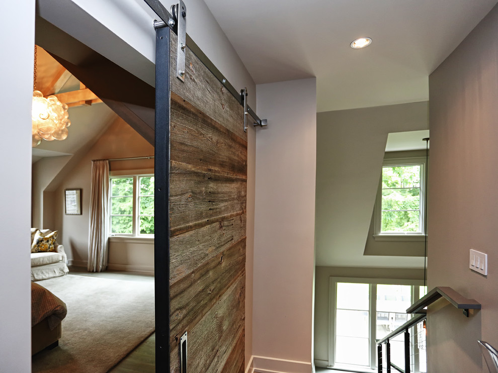 Bedroom - mid-sized modern master medium tone wood floor and brown floor bedroom idea in New York with beige walls
