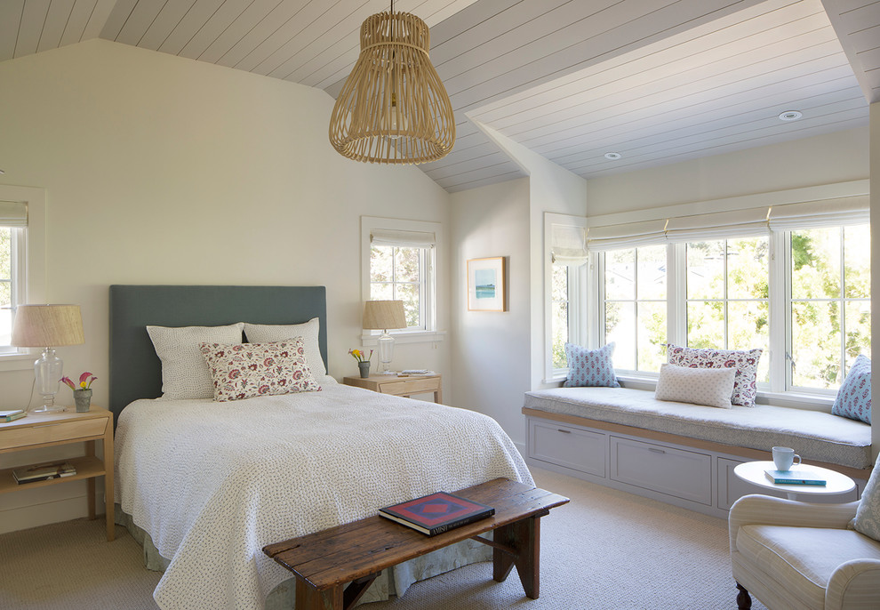 Large rural master bedroom in San Francisco with white walls, carpet, no fireplace and feature lighting.