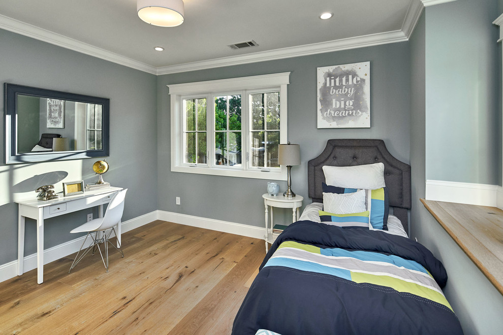 Photo of a medium sized rural guest bedroom in San Francisco with light hardwood flooring, grey floors and blue walls.