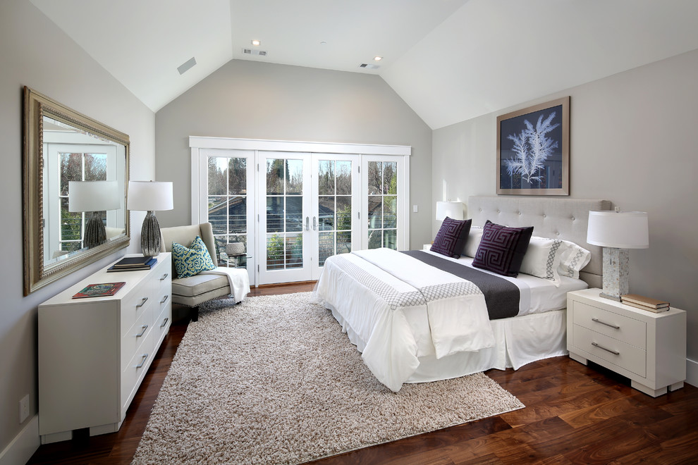 Bedroom - large traditional master medium tone wood floor bedroom idea in San Francisco with gray walls