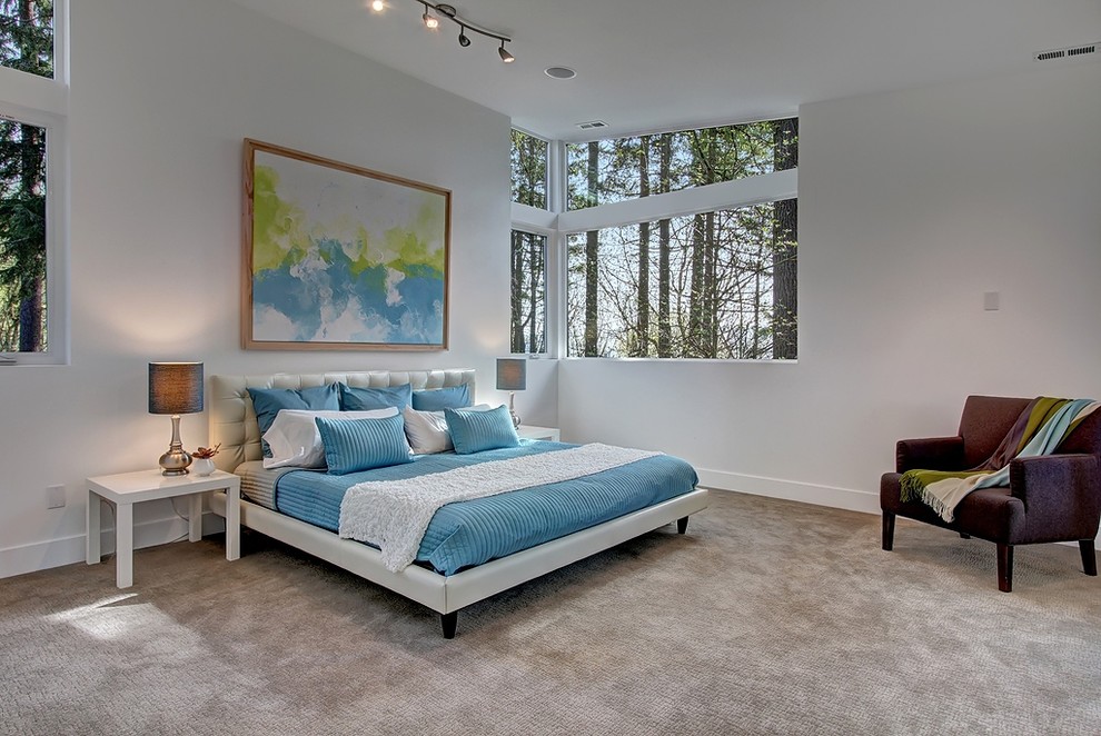 Inspiration for a contemporary carpeted bedroom remodel in Seattle with white walls and no fireplace