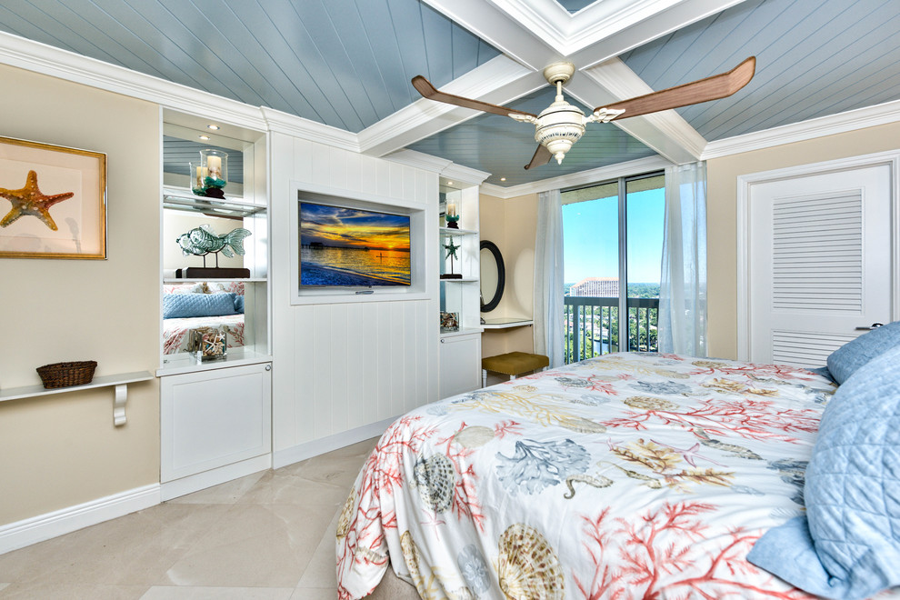 Large beach style guest marble floor bedroom photo in Miami with beige walls and no fireplace