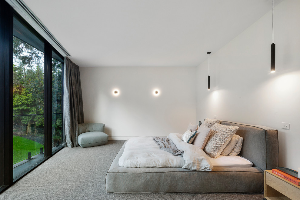 Inspiration for a contemporary master bedroom in Melbourne.
