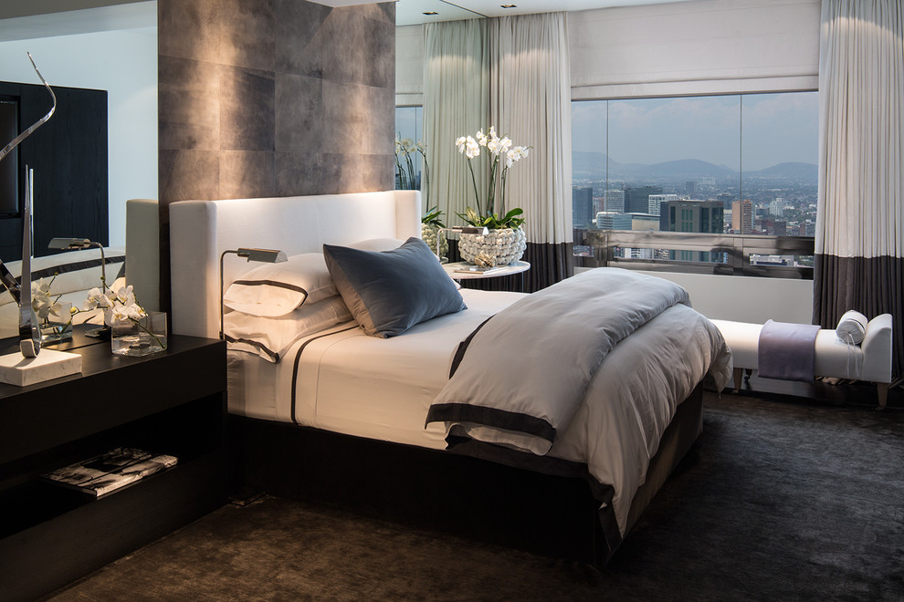 Medium sized contemporary master bedroom in Mexico City with white walls and carpet.